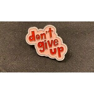 ‘Don’t give up’ enamel pin